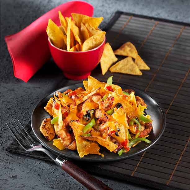 Nachos avec des lanières de poulet